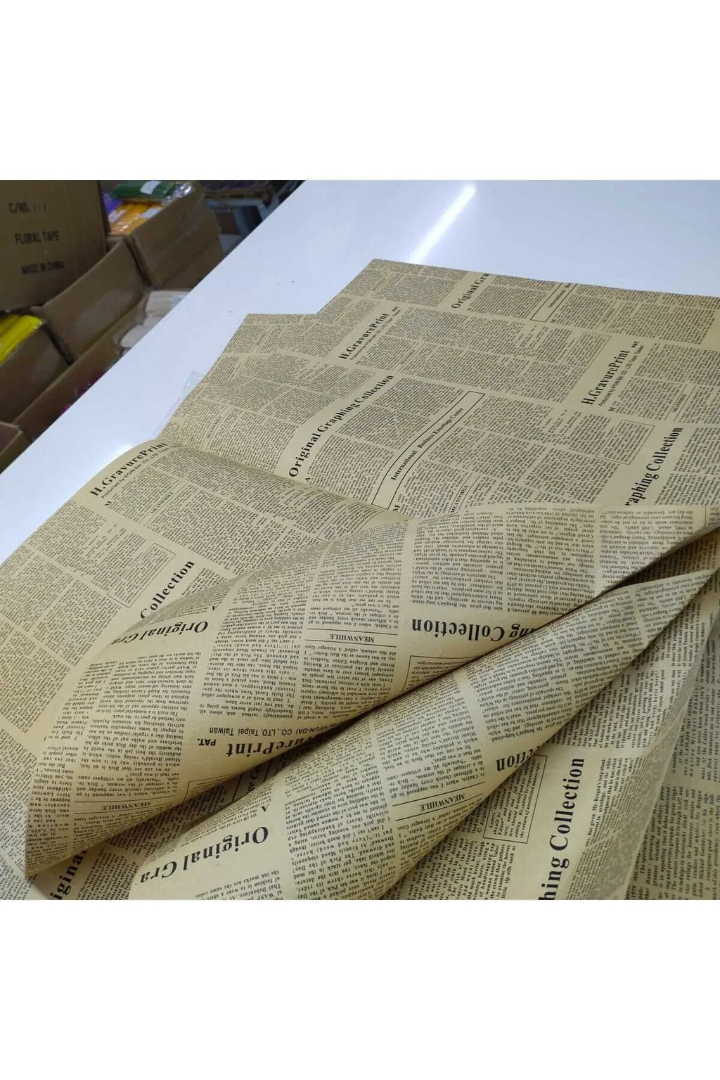 Buketlik Çiçek Ambalaj Kağıtı Gazete Çift Taraflı Baskılı 70*50 cm boyu 1 paket 38 adet.